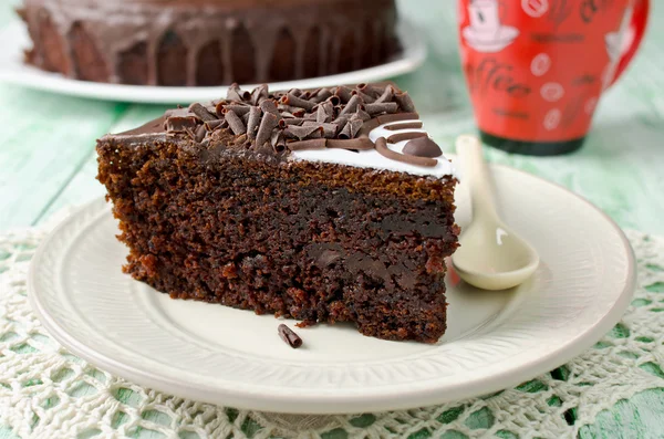 Piece of chocolate cake with banana — Stock Photo, Image