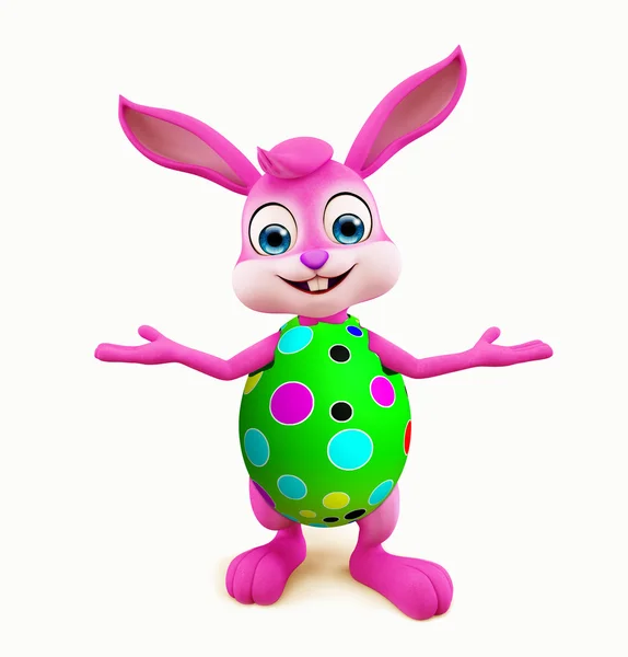Easter Bunny met kleurrijke eieren presentatie pose Stockafbeelding