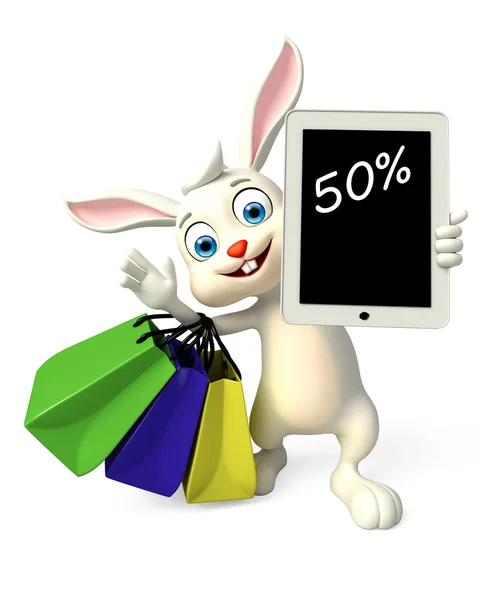 Easter Bunny met tabblad en boodschappentas Stockfoto