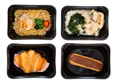 Karanlık bir arka planda, konteynırlarda yemek. Yemek servisi. Sağlıklı yemek. üzerinde görünüm.