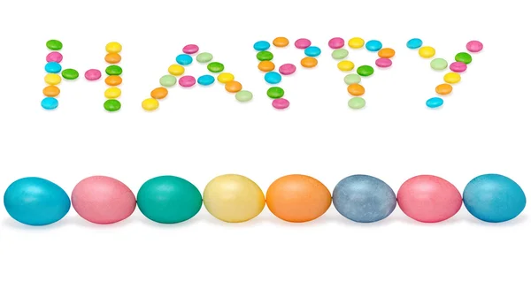 Happy easter image wiht eight eggs and candys pastel colored isolated on white — Stock Photo, Image