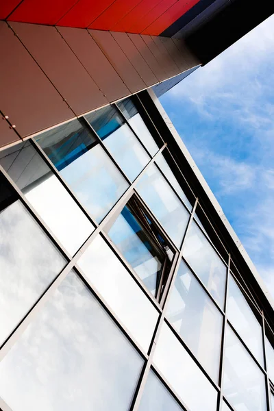Glass cladding panels and windows of modern buildings. Geometry and Perspective