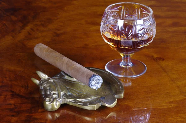 Cigar and glass of cognac