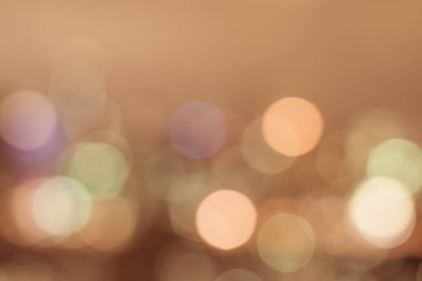 Renkli Bokeh gece ışıklarının bulanık arkaplanı Bangkok 'un havadan görünüşü altın mum ışığı rengi nostaljik ruh hali.