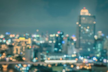 Bulanık şehir arka plan çatısı görüntüsü Bangkok şehir manzarası peyzaj gece ışıkları bokeh