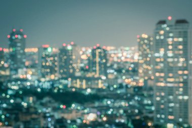 Şehir manzarası manzarasının arka plan çatısı manzarası peyzaj gece ışıkları bokeh