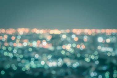 Bulanık soyut arkaplan, lüks ışıklandırma ışığı gece Bangkok şehir manzarasının klasik çatı manzarası renginde bokeh 