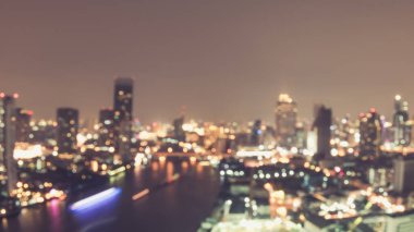 Bulanık şehir arka plan çatısı görüntüsü Bangkok şehir manzarası peyzaj gece ışıkları bokeh  