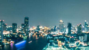 Bulanık şehir arkaplan çatı manzarası şehir manzarası peyzaj gece lambaları süper bir klasik tarzla sallanıyor.