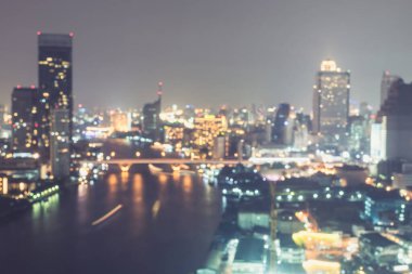 Bulanık şehir arka plan çatısı görüntüsü Bangkok şehir manzarası peyzaj gece ışıkları bokeh  