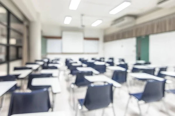 Blur classroom education background empty school class lecture room interior view with no teacher nor student