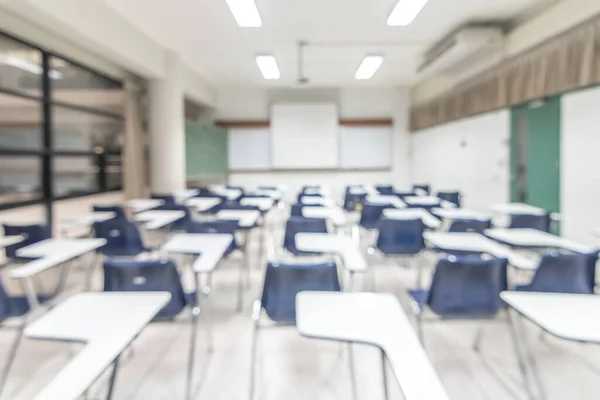 Blur classroom education background empty school class lecture room interior view with no teacher nor student