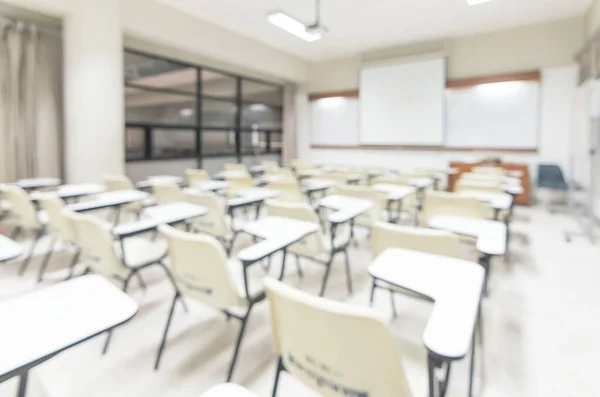 Blur classroom education background empty school class lecture room interior view with no teacher nor student