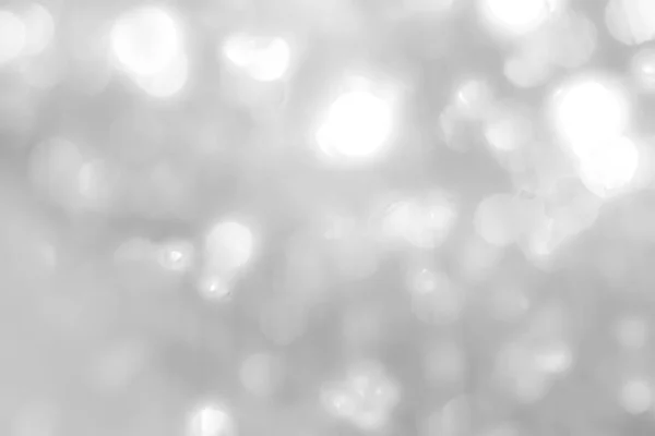 Размытие Абстрактного Фона Серебро Яркий Сверкающий Белый Свет Блестящий Боке — стоковое фото