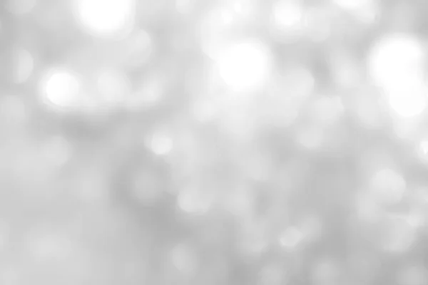 Размытие Абстрактного Фона Серебро Яркий Сверкающий Белый Свет Блестящий Боке — стоковое фото