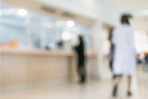 Verwischen Medizinischer Hintergrund Klinik Service Schalter Lobby Mit Patienten Zahlen — Stockfoto