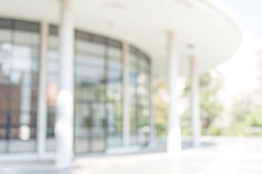 Bulanık ofis arka plan binası. Bulanık ışık saçan cam pencere lobisi için dış görünüm.