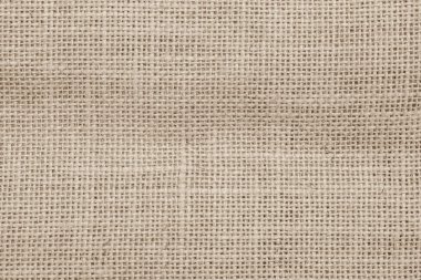 Jute hessian çuval bezi örülmüş çuval bezi arkaplan sepya kremi eski kahverengi renk