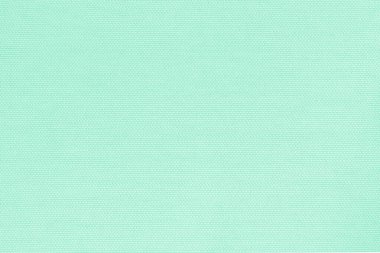 Pamuktan örülmüş keten kumaşlar tekstil dokulu açık renkli pastel yeşil arka plan