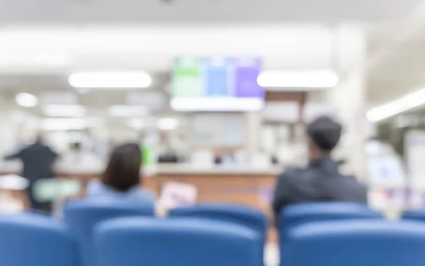 Medical blur background patient service counter, hospital lobby, cashier and pharmacy dispensary counter blurry interior inside waiting hall area