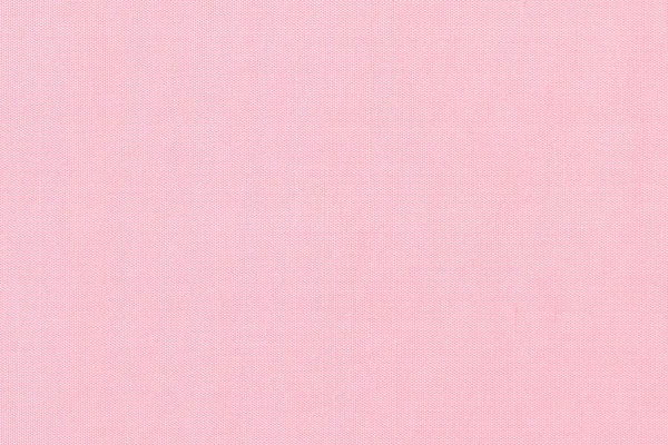 コットンシルク生地の壁紙テクスチャパターンの背景に薄いピンクレッドパステルカラーでブレンド — ストック写真