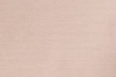 Pamuk örülmüş kumaşlar, tekstil desenli arkaplan açık soluk bej rengi.