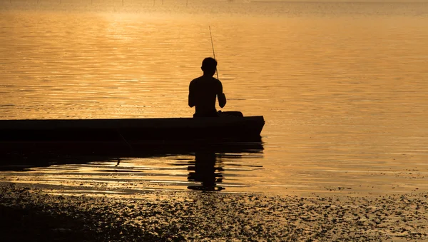 Silhouette de pêcheur — Photo