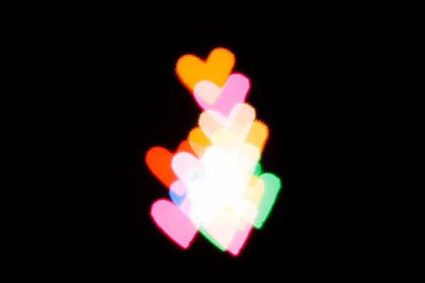 Szív alakú fény életlenítés háttér — Stock Fotó