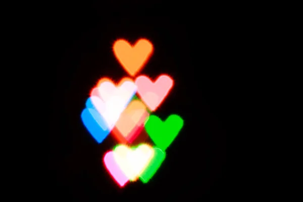 Szív alakú fény életlenítés háttér — Stock Fotó