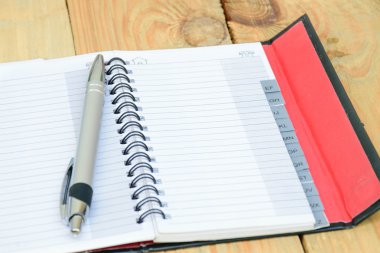 blank phone book on wood