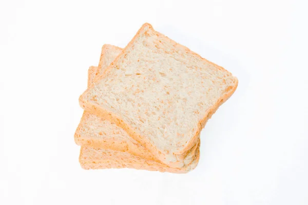 Накладываемый хлеб на белом фоне — стоковое фото
