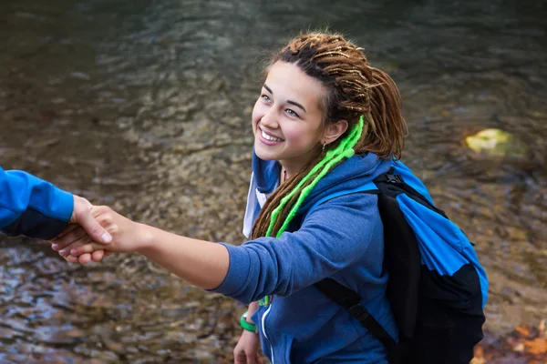 Two Hikers young Man and Smiling Woman holding hands — Stock Photo, Image