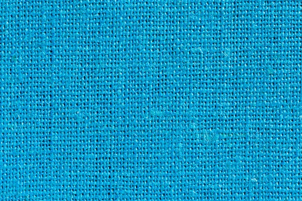 Hellblauer Stoffhintergrund mit klarer Leinwandstruktur — Stockfoto
