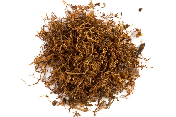 Heap of dry Pipe Tobacco na vista superior branca — Fotografia de Stock