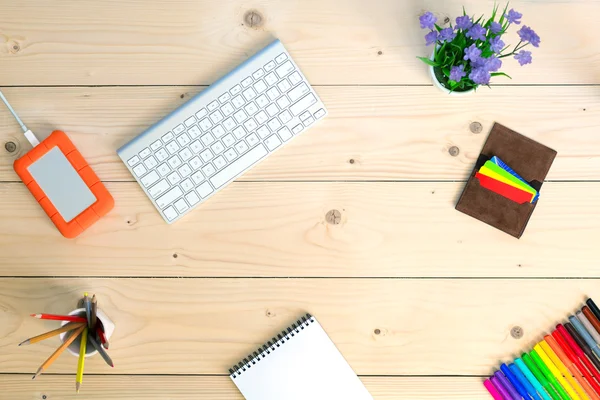 Working Place on Cozy light wooden Table with Notepad — Stock Photo, Image