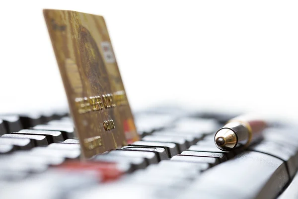 Yellow Credit Card on black Computer Keyboard and Pen — Stock Photo, Image