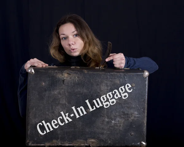 Female tourist and suitcase — Stock Photo, Image