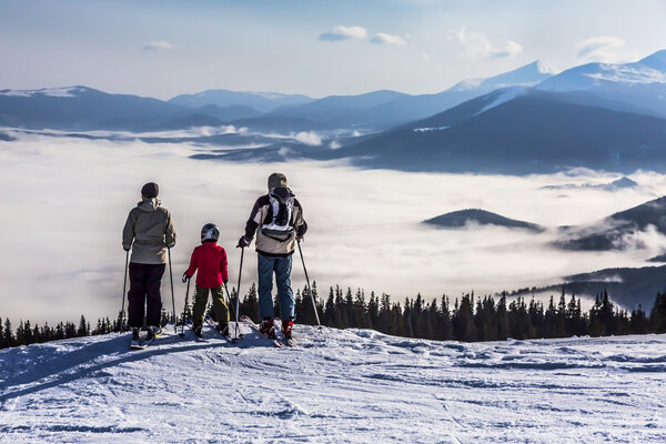 People observing mountain scenery