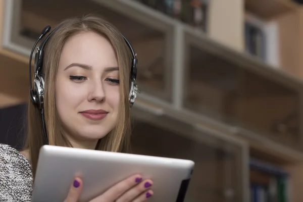 Lady busy with electronic devise — Stock Photo, Image