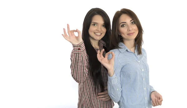 Two cheerful girls makes OK hand sign — Stock Photo, Image