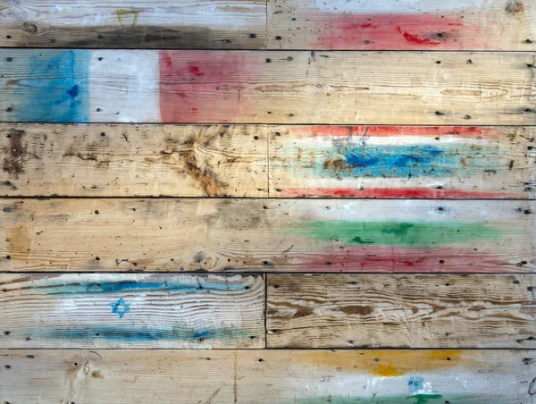 Wood wall warm brown texture background with flags — Stockfoto