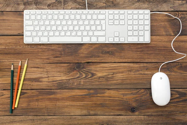 Empty workspace on wooden table — Stock Photo, Image