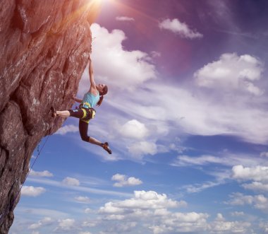 Climber hanging on her hand clipart