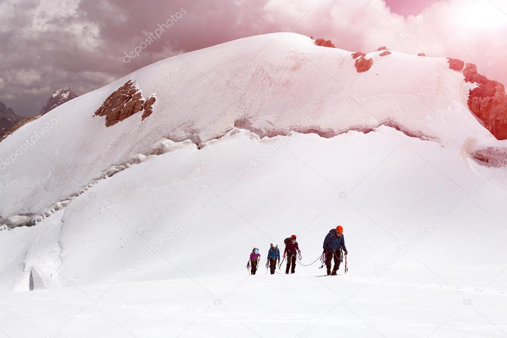 Group of Climbers Approaching to Summit