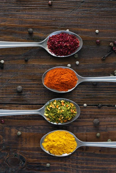 Variety of Eastern Spices in Silver Spoons — Stock Photo, Image