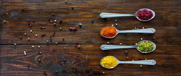 Variety of Eastern Spices in Silver Spoons — Stock Photo, Image