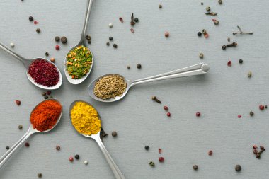 Close Up of Five Sorts of Asian Seasoning on Wooden Background