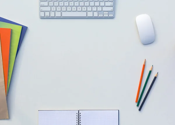 Creative Office Bright Table with Matching Color Magazines and Pencils Computer and Notepad — Stock Photo, Image