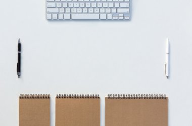 White Office Desk with Business Items Computer