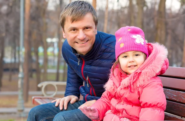 Portrait of father and little baby daughter looking into camera — Stock Photo, Image